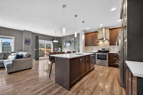 242 Mahogany Passage Se, Calgary, AB - Indoor Photo Showing Kitchen With Double Sink With Upgraded Kitchen