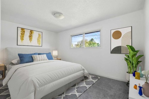 1640 15 Street Se, Calgary, AB - Indoor Photo Showing Bedroom