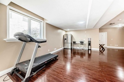 29 Simcoe Gate Sw, Calgary, AB - Indoor Photo Showing Gym Room
