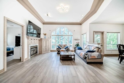 29 Simcoe Gate Sw, Calgary, AB - Indoor Photo Showing Living Room With Fireplace