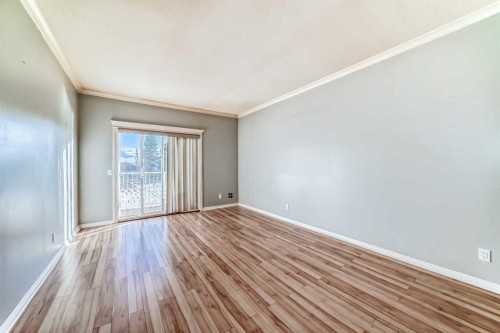 205-7 Lineham Avenue, Okotoks, AB - Indoor Photo Showing Other Room