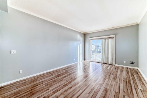 205-7 Lineham Avenue, Okotoks, AB - Indoor Photo Showing Other Room