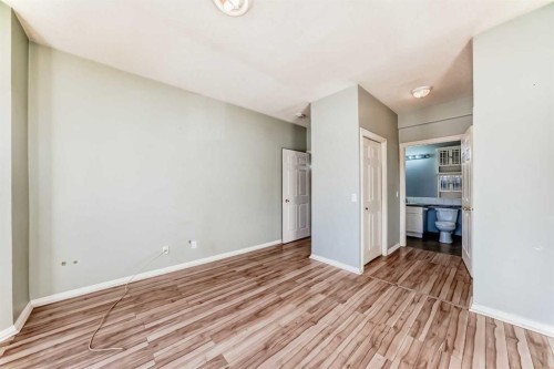 205-7 Lineham Avenue, Okotoks, AB - Indoor Photo Showing Other Room