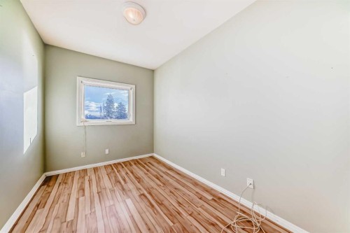 205-7 Lineham Avenue, Okotoks, AB - Indoor Photo Showing Other Room