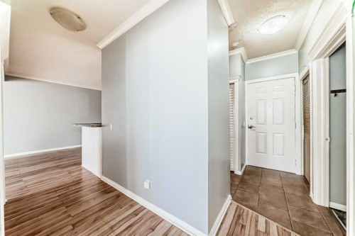 205-7 Lineham Avenue, Okotoks, AB - Indoor Photo Showing Other Room