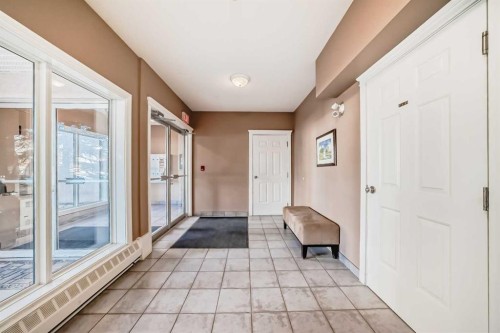 205-7 Lineham Avenue, Okotoks, AB - Indoor Photo Showing Other Room