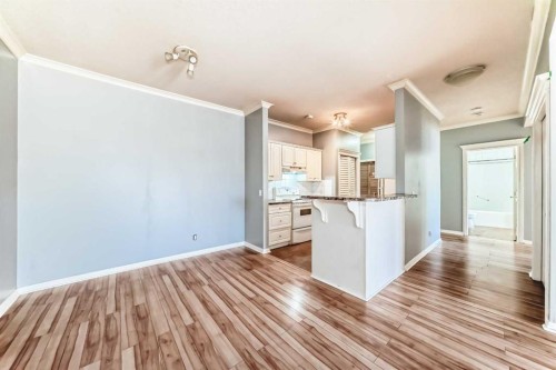 205-7 Lineham Avenue, Okotoks, AB - Indoor Photo Showing Kitchen