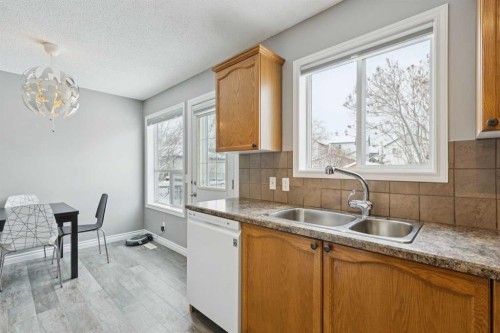 42 Hidden Hills Way Nw, Calgary, AB - Indoor Photo Showing Kitchen With Double Sink