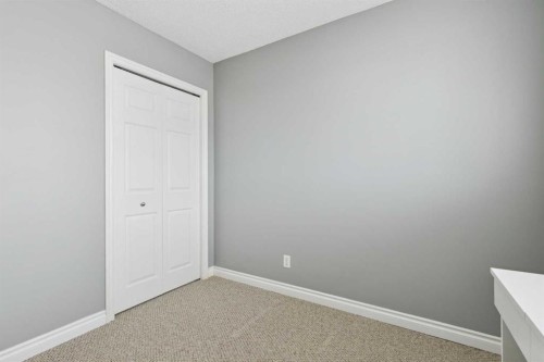 42 Hidden Hills Way Nw, Calgary, AB - Indoor Photo Showing Other Room