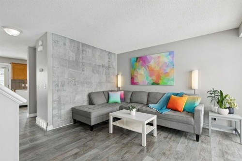 42 Hidden Hills Way Nw, Calgary, AB - Indoor Photo Showing Living Room