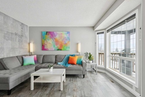 42 Hidden Hills Way Nw, Calgary, AB - Indoor Photo Showing Living Room