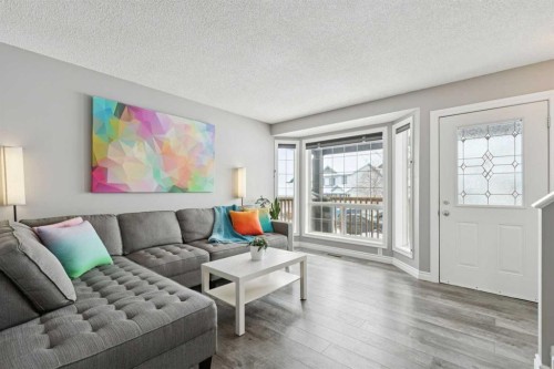 42 Hidden Hills Way Nw, Calgary, AB - Indoor Photo Showing Living Room