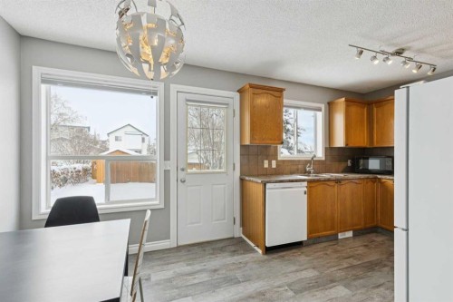 42 Hidden Hills Way Nw, Calgary, AB - Indoor Photo Showing Other Room