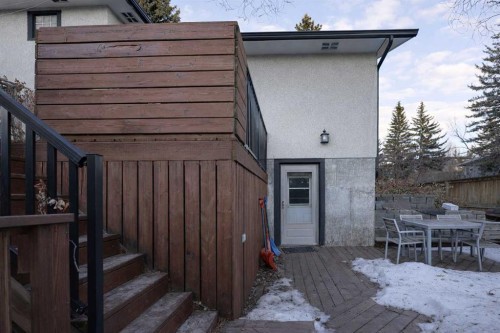 102 Dalgleish Bay Nw, Calgary, AB - Outdoor With Deck Patio Veranda With Exterior