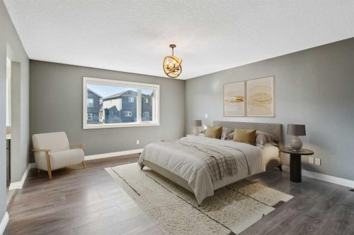 383 Evansglen Drive Nw, Calgary, AB - Indoor Photo Showing Bedroom