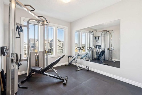383 Evansglen Drive Nw, Calgary, AB - Indoor Photo Showing Gym Room