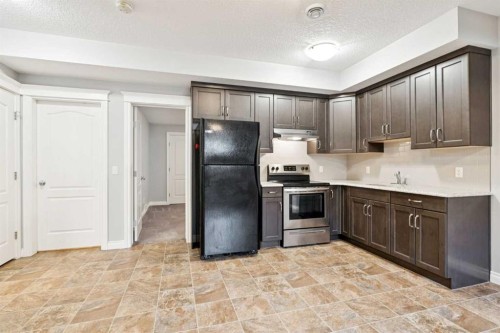 383 Evansglen Drive Nw, Calgary, AB - Indoor Photo Showing Kitchen