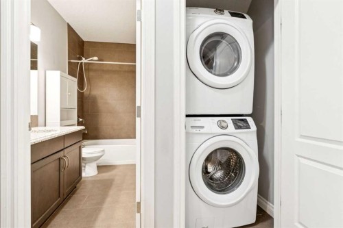 383 Evansglen Drive Nw, Calgary, AB - Indoor Photo Showing Laundry Room