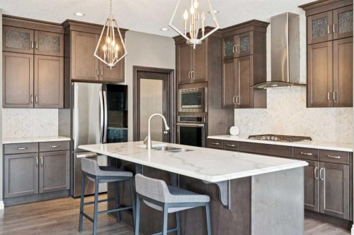 383 Evansglen Drive Nw, Calgary, AB - Indoor Photo Showing Kitchen With Double Sink With Upgraded Kitchen