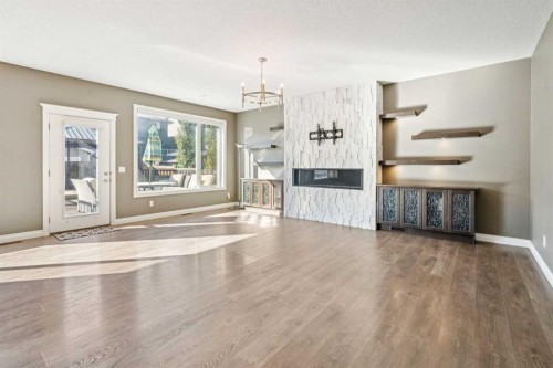 383 Evansglen Drive Nw, Calgary, AB - Indoor With Fireplace