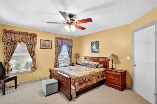 125 Copeland Close, Langdon, AB - Indoor Photo Showing Bedroom