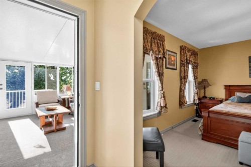 125 Copeland Close, Langdon, AB - Indoor Photo Showing Bedroom
