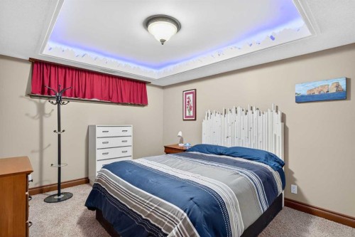 125 Copeland Close, Langdon, AB - Indoor Photo Showing Bedroom