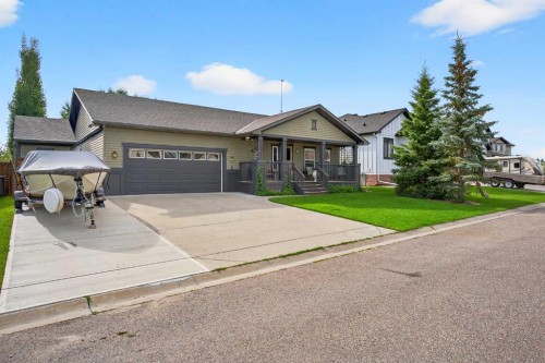 125 Copeland Close, Langdon, AB - Outdoor With Facade