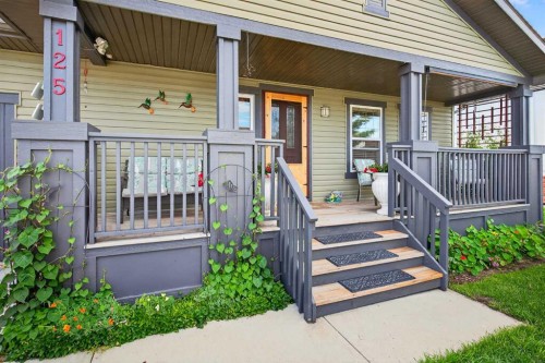 125 Copeland Close, Langdon, AB - Outdoor With Deck Patio Veranda With Exterior