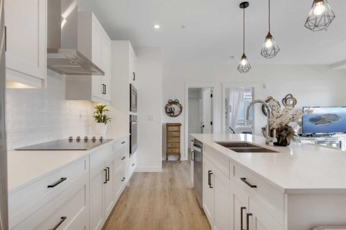 116-10 Sage Hill Walk Nw, Calgary, AB - Indoor Photo Showing Kitchen With Double Sink With Upgraded Kitchen