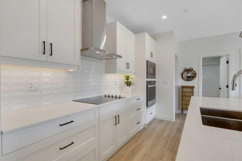116-10 Sage Hill Walk Nw, Calgary, AB - Indoor Photo Showing Kitchen With Double Sink With Upgraded Kitchen