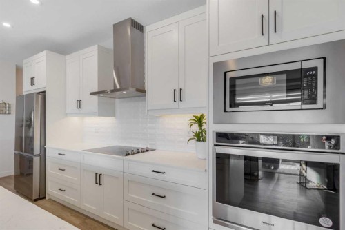 116-10 Sage Hill Walk Nw, Calgary, AB - Indoor Photo Showing Kitchen With Stainless Steel Kitchen With Upgraded Kitchen