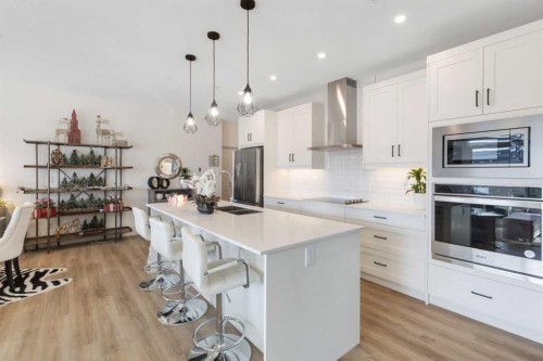 116-10 Sage Hill Walk Nw, Calgary, AB - Indoor Photo Showing Kitchen With Stainless Steel Kitchen With Upgraded Kitchen