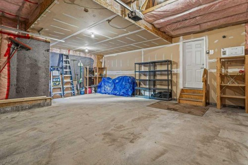 215 Miskow Close, Canmore, AB - Indoor Photo Showing Garage