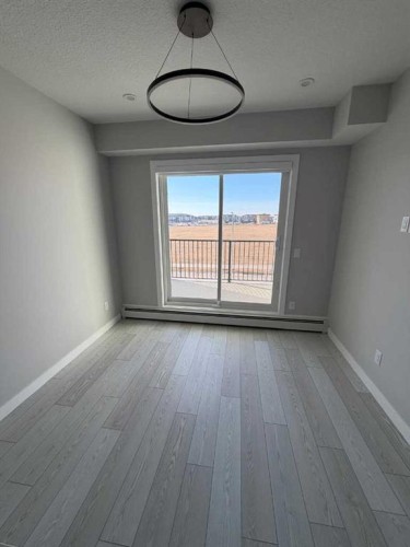 1314-63 Corner Glen Crescent, Calgary, AB - Indoor Photo Showing Other Room