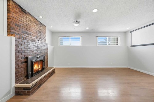 6011 Temple Drive Ne, Calgary, AB - Indoor With Fireplace