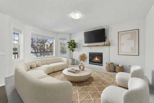 641 Evermeadow Road Sw, Calgary, AB - Indoor Photo Showing Living Room With Fireplace