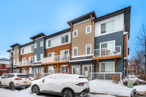 59-111 Rainbow Falls Gate, Chestermere, AB - Outdoor With Facade
