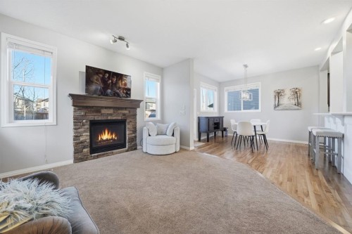 99 Sage Valley Park Nw, Calgary, AB - Indoor Photo Showing Living Room With Fireplace