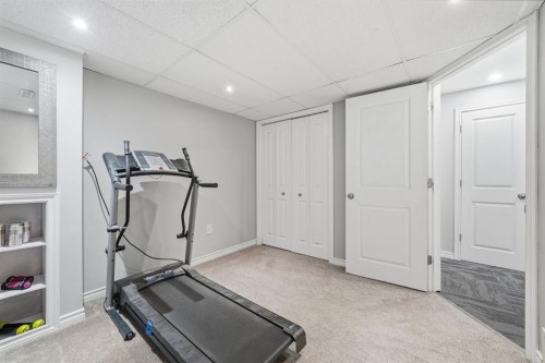 99 Sage Valley Park Nw, Calgary, AB - Indoor Photo Showing Gym Room