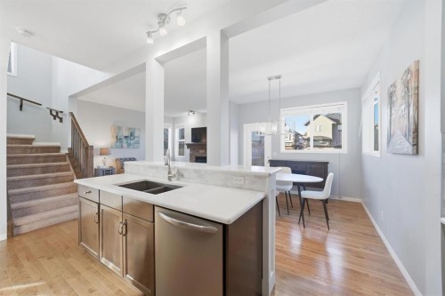 99 Sage Valley Park Nw, Calgary, AB - Indoor Photo Showing Kitchen With Double Sink