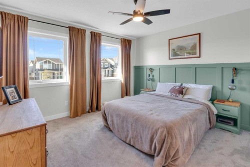 374 Sundown Road, Cochrane, AB - Indoor Photo Showing Bedroom