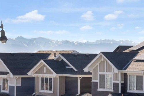 374 Sundown Road, Cochrane, AB - Outdoor With Facade