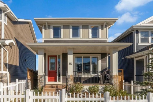 374 Sundown Road, Cochrane, AB - Outdoor With Deck Patio Veranda With Facade