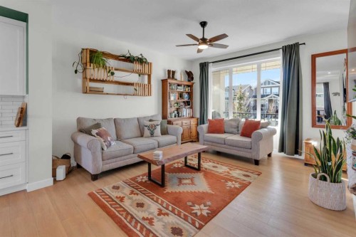 374 Sundown Road, Cochrane, AB - Indoor Photo Showing Living Room