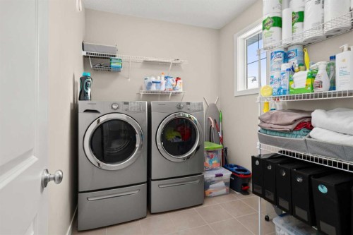 49 Evansview Manor Nw, Calgary, AB - Indoor Photo Showing Laundry Room
