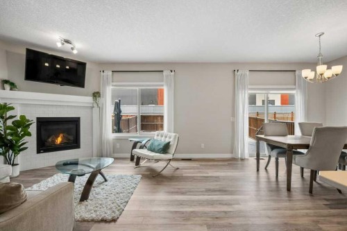 183 Kinniburgh Road, Chestermere, AB - Indoor With Fireplace