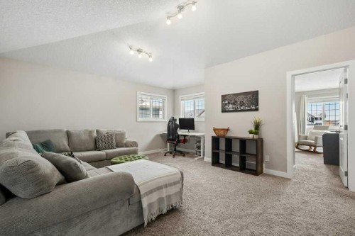 183 Kinniburgh Road, Chestermere, AB - Indoor Photo Showing Living Room