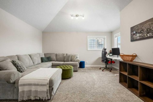 183 Kinniburgh Road, Chestermere, AB - Indoor Photo Showing Living Room