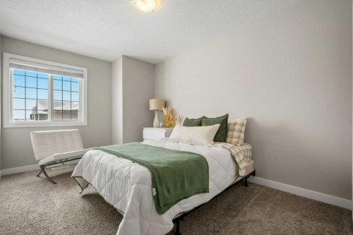 183 Kinniburgh Road, Chestermere, AB - Indoor Photo Showing Bedroom